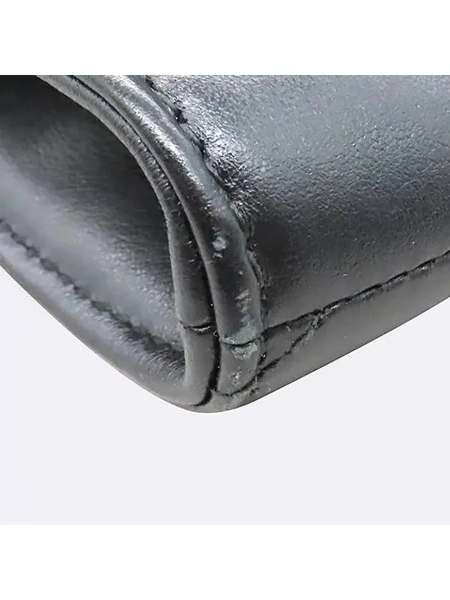 498079 Black leather GG Marmont Matelasse clutch bag